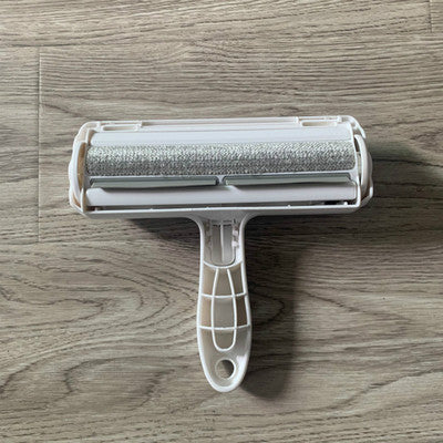 Pet roller sticking device